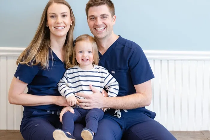 Dr. Ben Trottier and Dr. Sara Trottier with their daughter